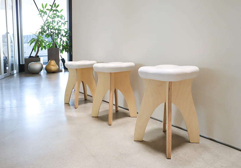 STOOTH stools by a window