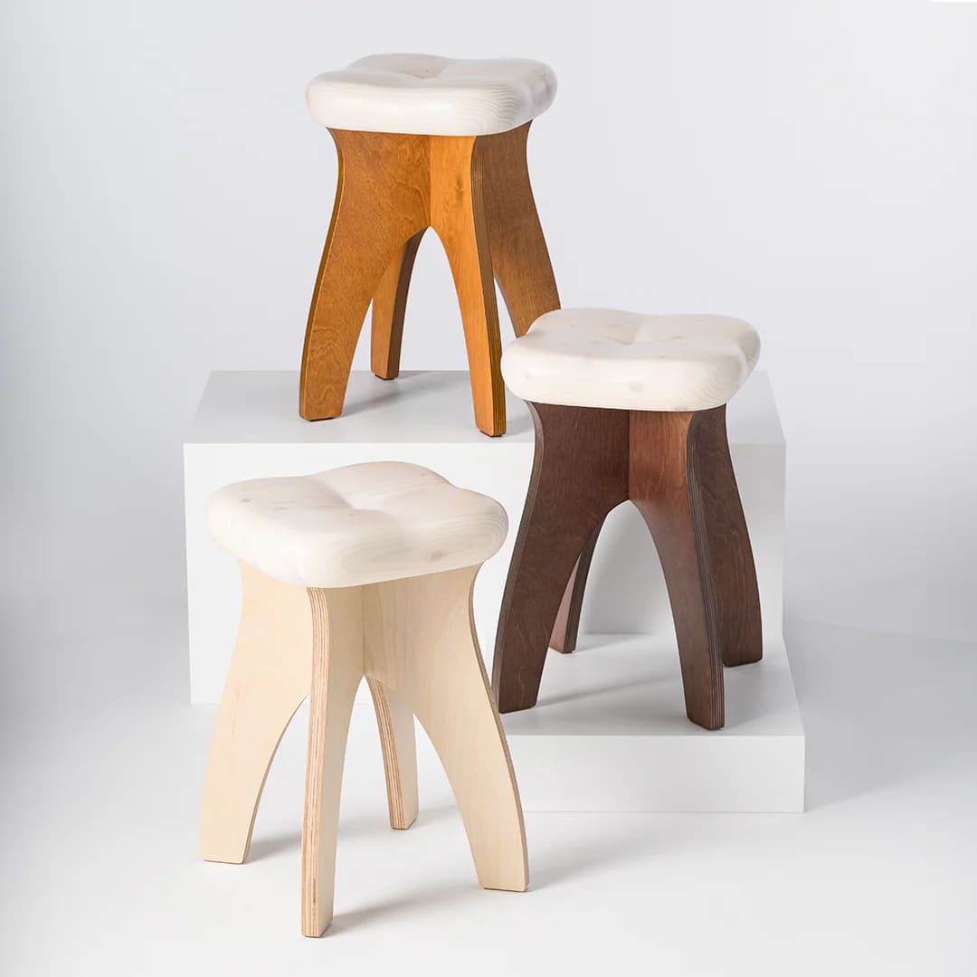 STOOTH stools in three wood tones
